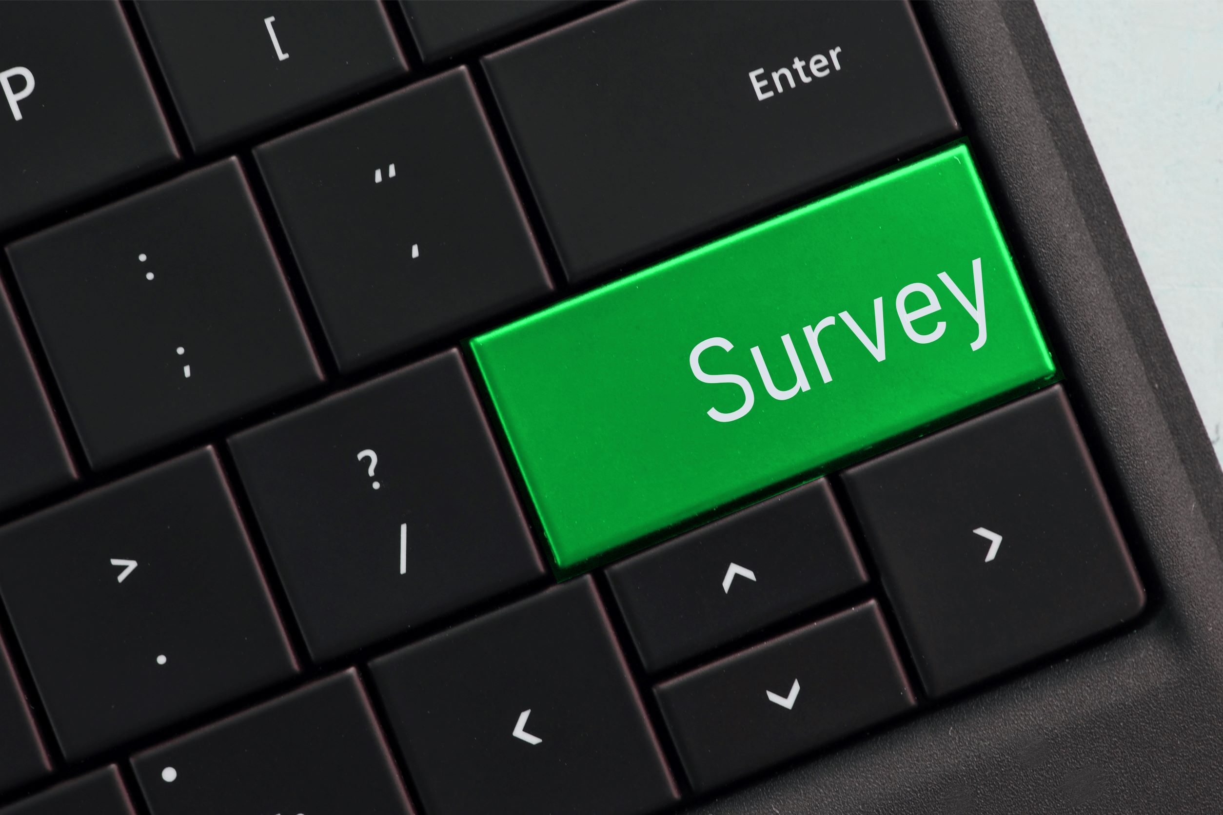 Computer keyboard with a survey button Computer keyboard with a survey button.
