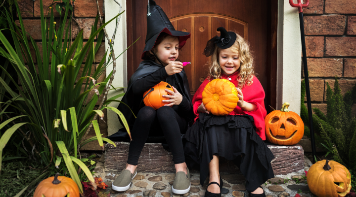 halloween Children dressed up for halloween with pumpkins