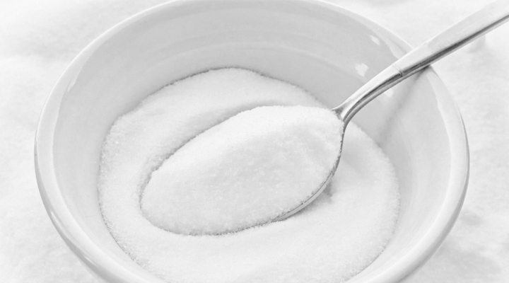 Bowl of sugar or sugar-like substance